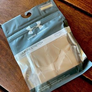 New. Never opened.  Under Armour UA Pure Stretch Hipsters.